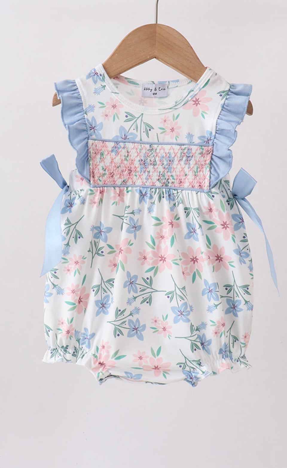 Blue floral smocked ruffle bubble