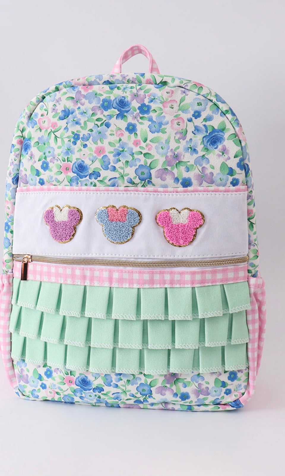 Character French knot ruffle backpack